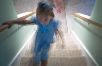 Clothed, Ascending a Staircase